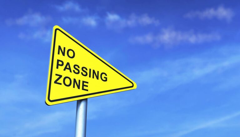 no passing zone sign
