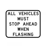 R13-2T All Vehicles Must Stop Ahead When Flashing Sign